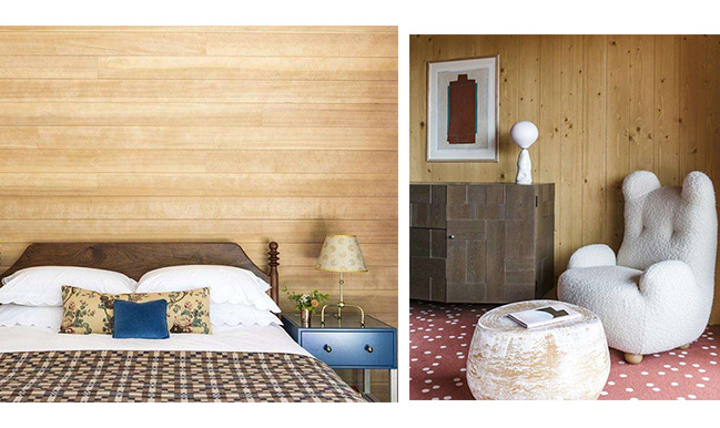 bedroom with light wood paneling