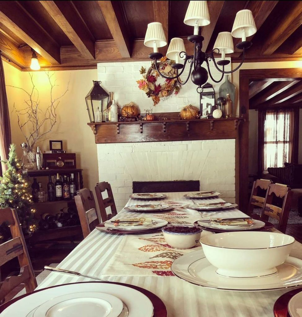 dining room with exposed beams